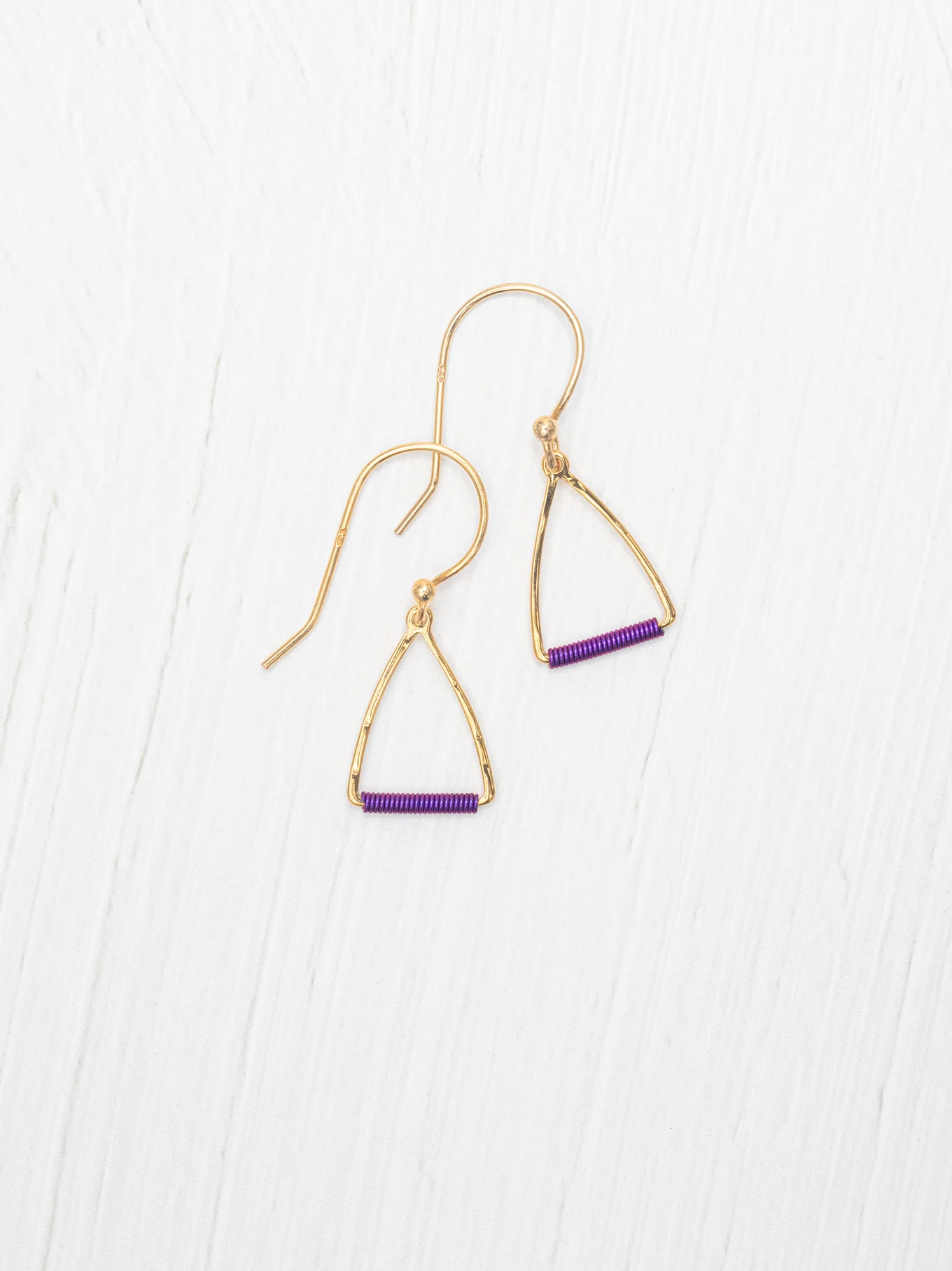 purple triangle earrings by Holly Yashi