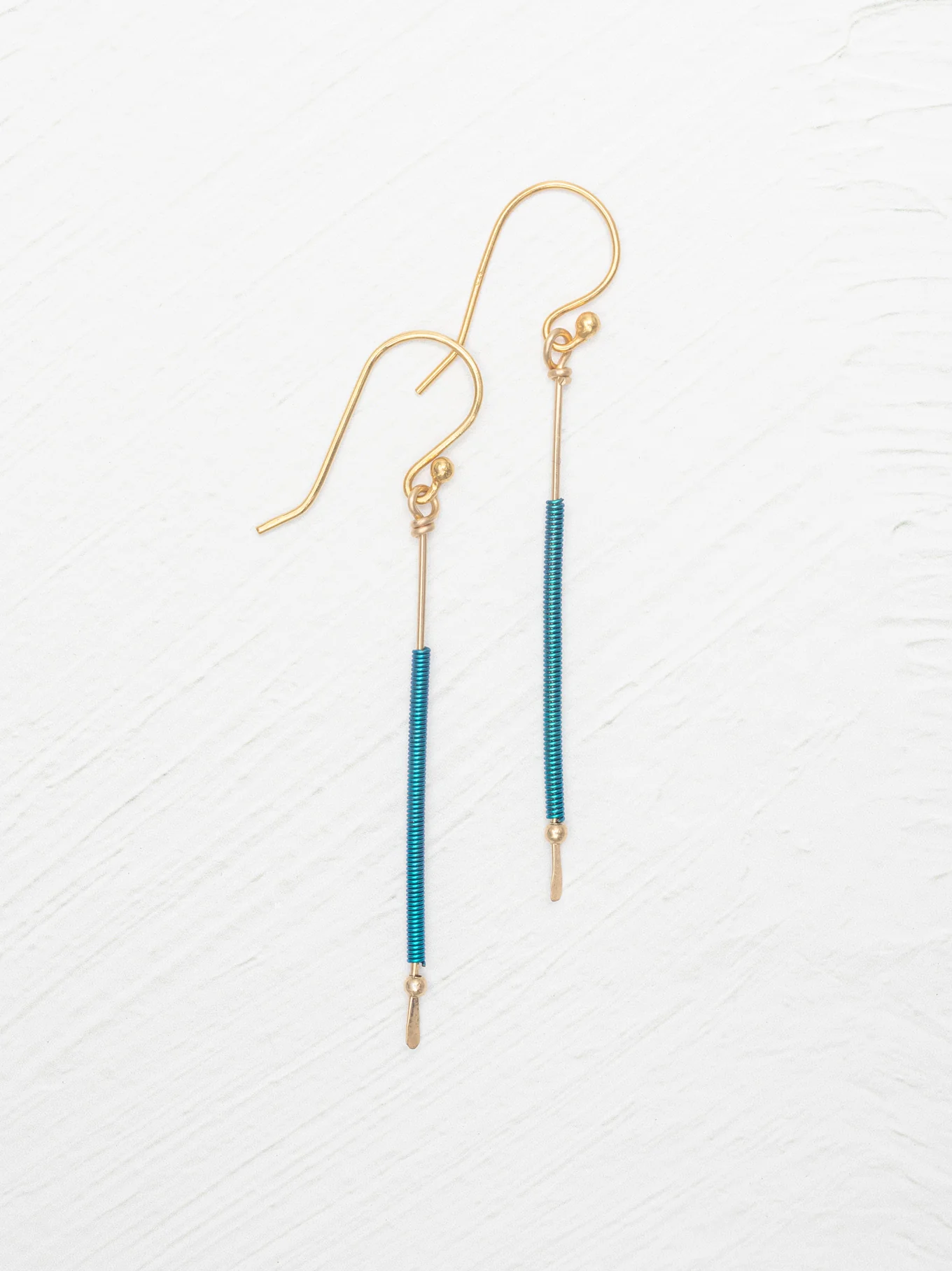 long teal stick earrings