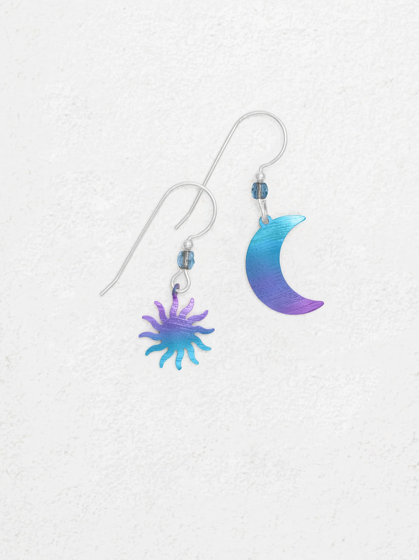 purple and blue sun and moon earrings