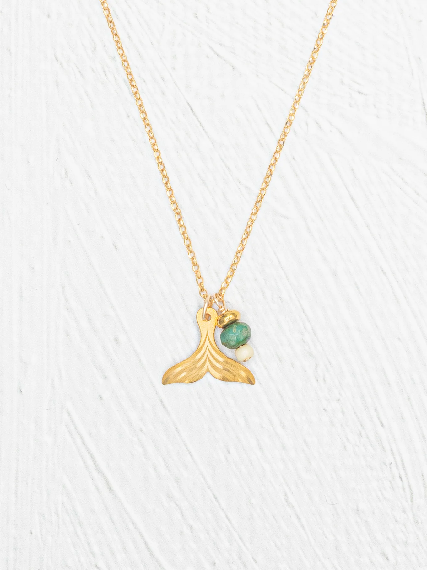 whale tail necklace by Holly Yashi