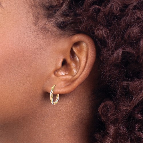 tri-color petite gold hoop earrings on model