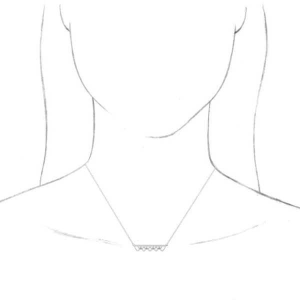 dainty filigree bar necklace on sketch of person to help you gauge scale