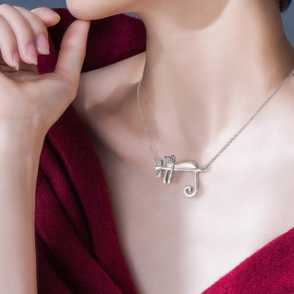 cat necklace on woman