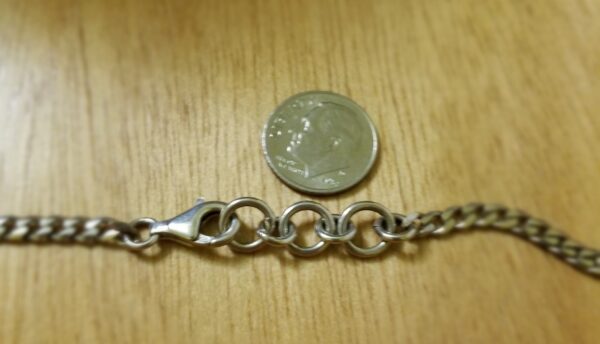 clasp on vintage coin necklace with dime for scale