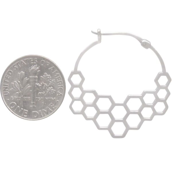 honeycomb earring with dime to show scale