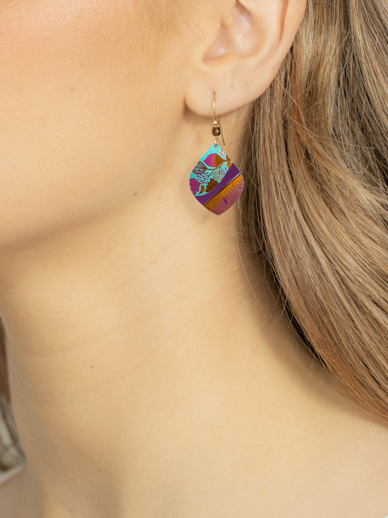 Tropical inspired earrings by Holly Yashi on model