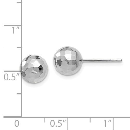 textured white gold ball earrings with ruler