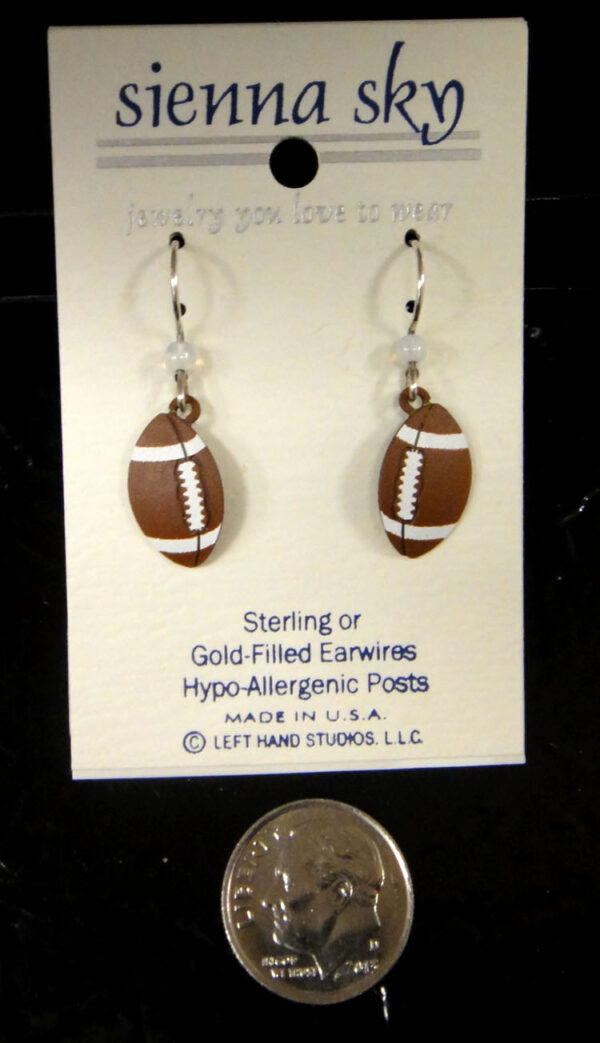 football earrings with dime to help you gauge scale