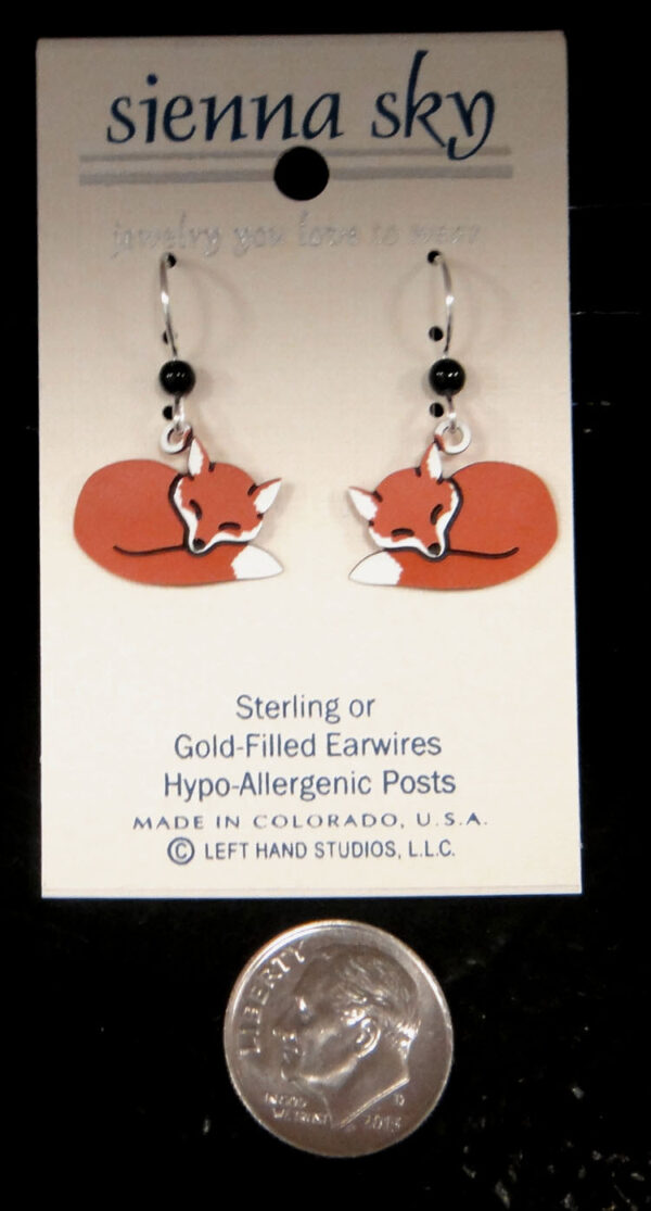 sleeping fox earrings with dime for size comparison