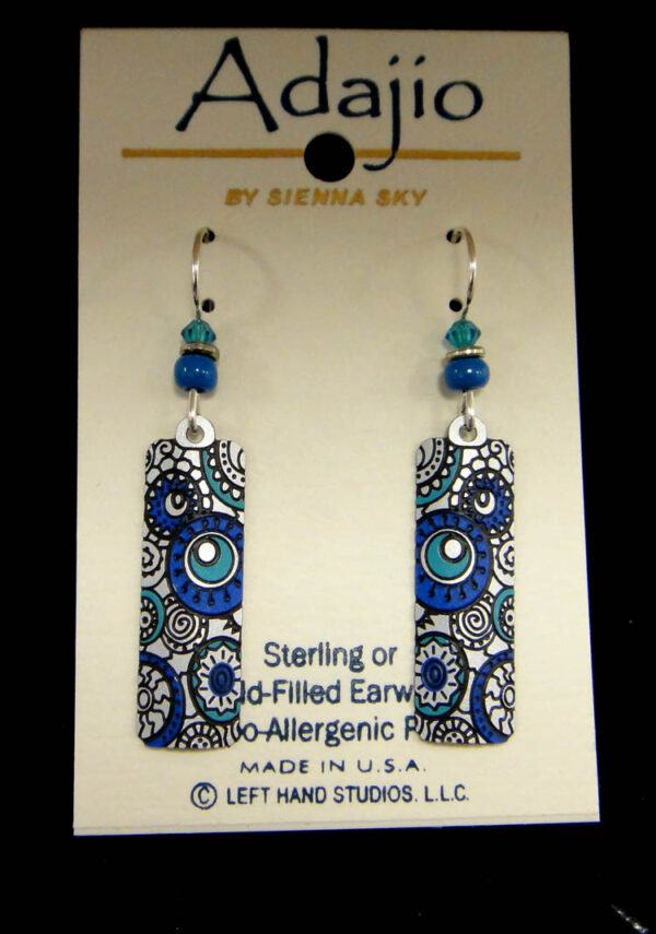 Whimsical blue, teal, and metallic gray earrings on earring card