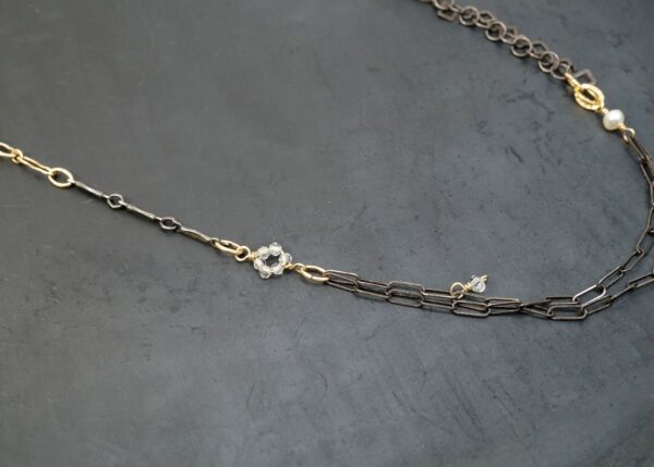 dainty mixed metal necklace with pearl and quartz accents