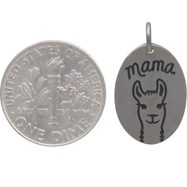 mama llama charm with dime to help show scale