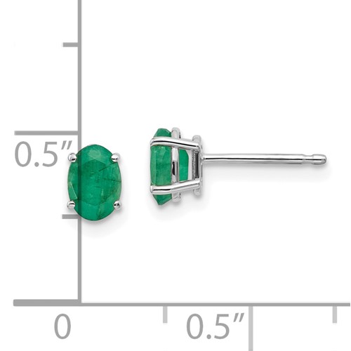 emerald stud earrings with ruler