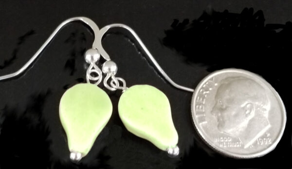 alien earrings with dime for scale
