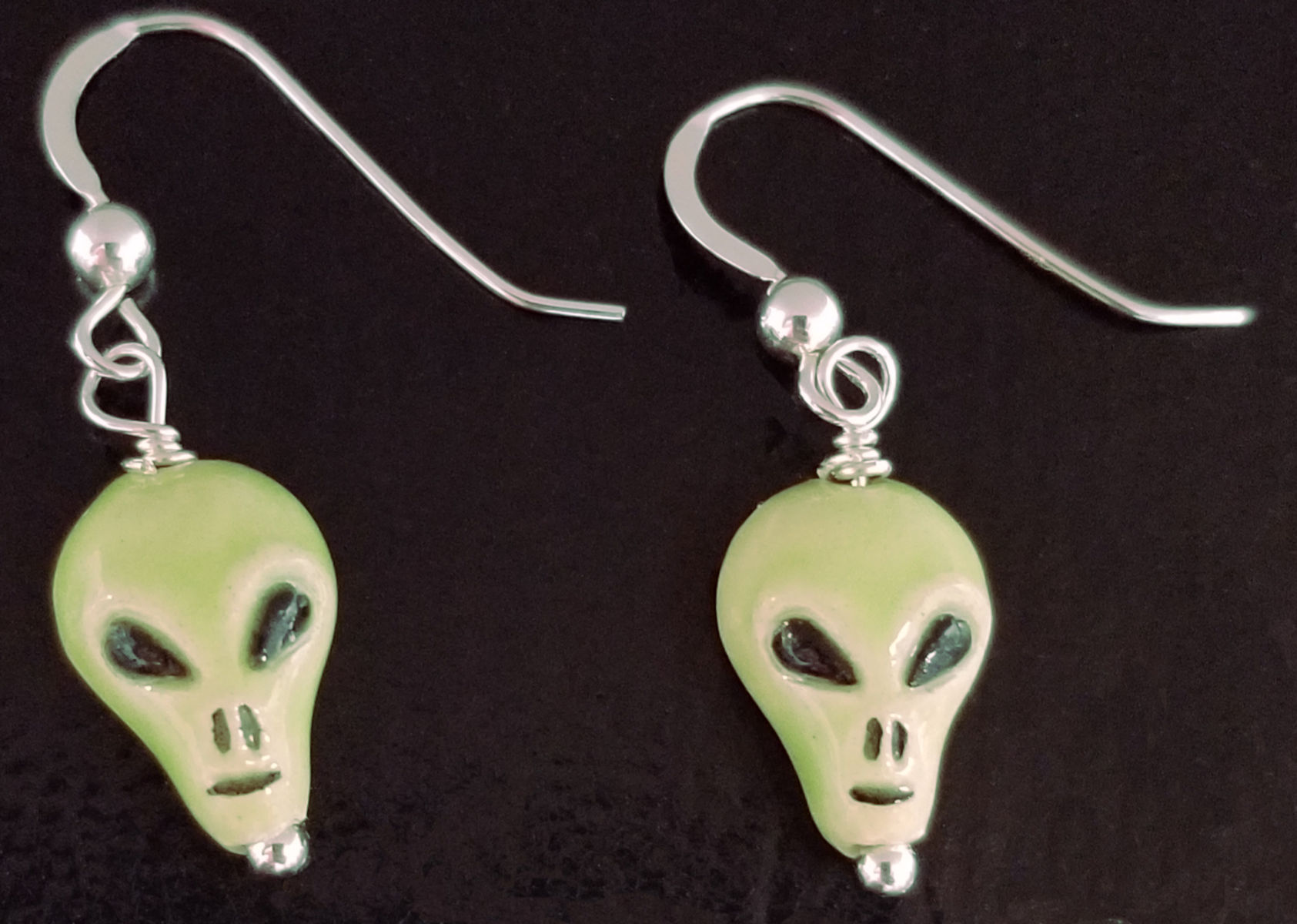 green alien ceramic earrings