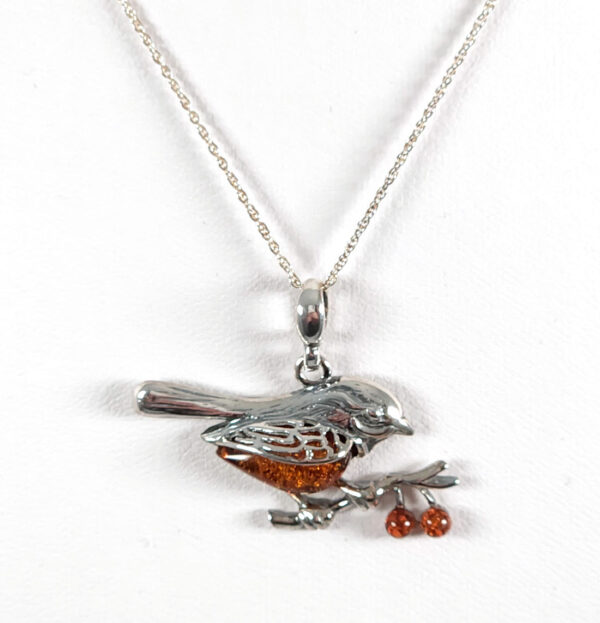 Amber and sterling silver bird necklace