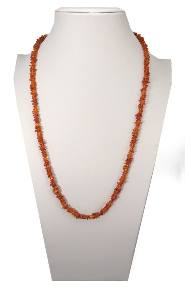 Long Baltic amber beaded necklace on neckform