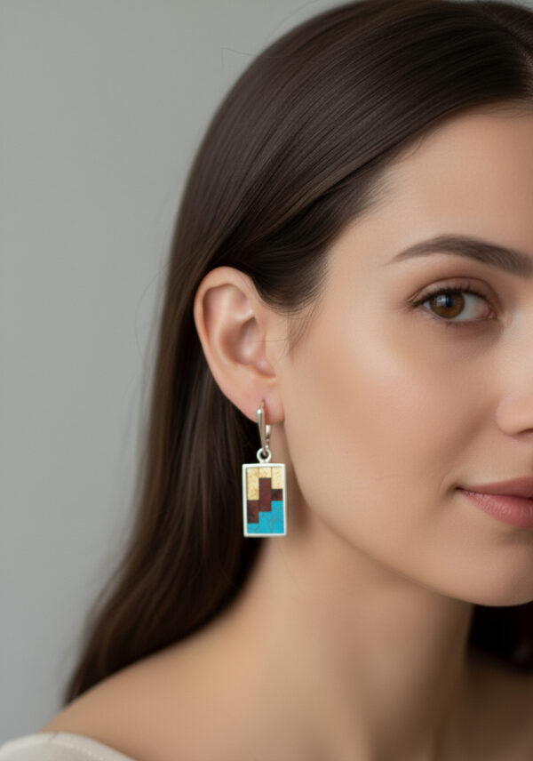 amber and turquoise earrings on model