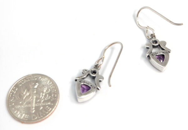 backside of amethyst earrings with dime for size comparison