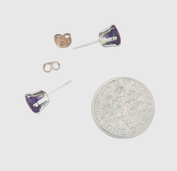 amethyst stud earrings with dime for size comparison