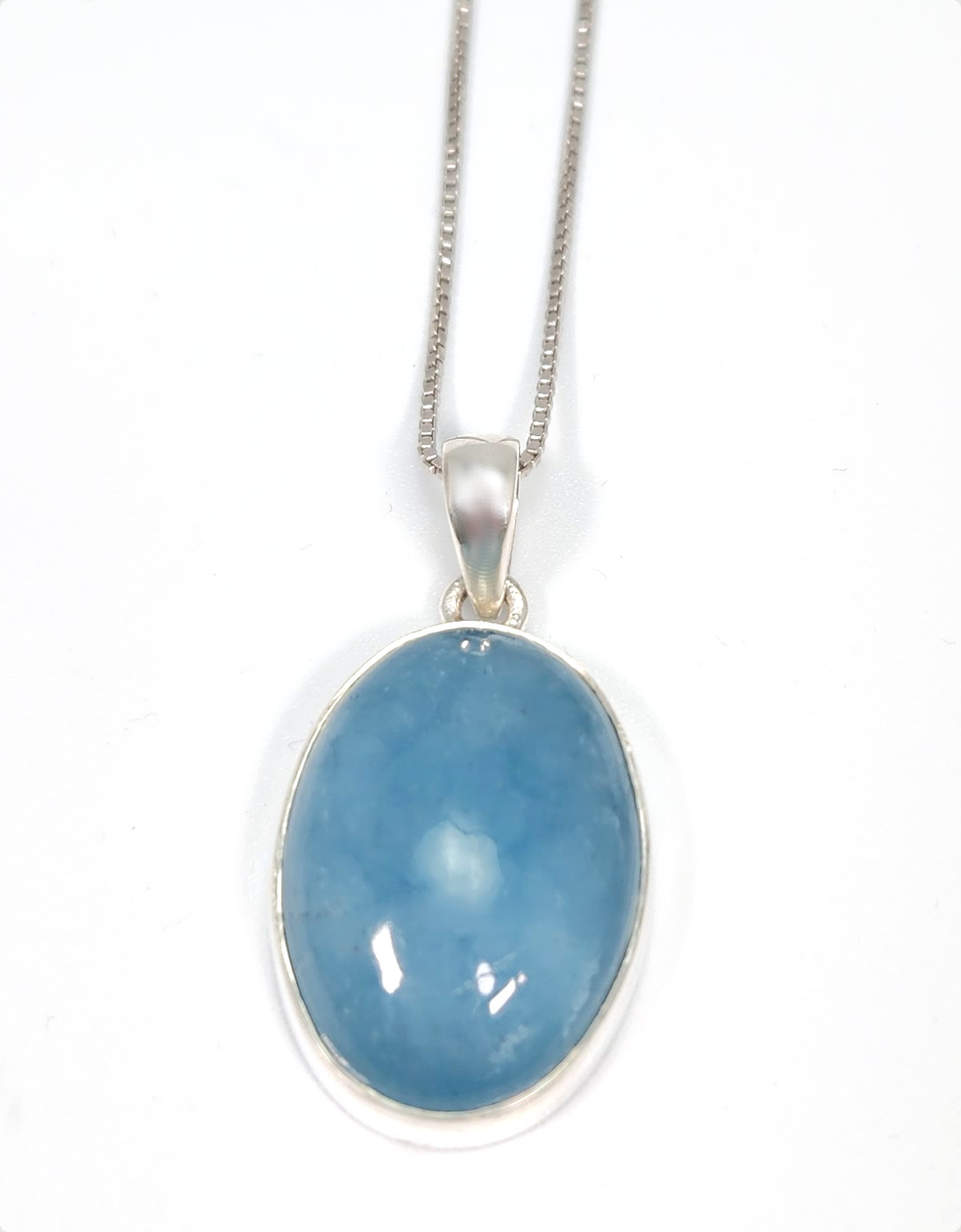 aquamarine oval pendant on 20 inch box chain necklace