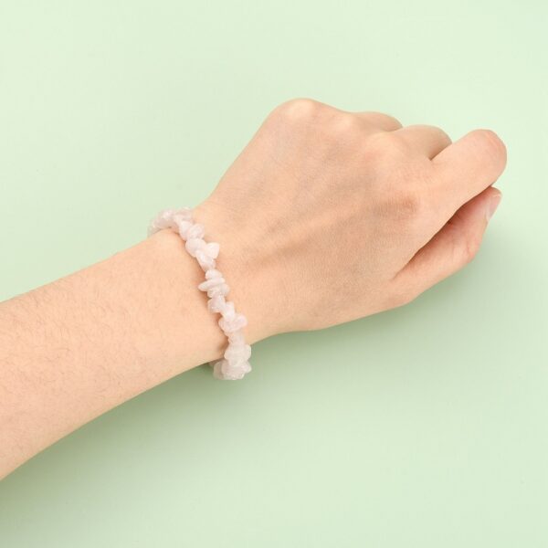 rose quartz bracelet on wrist
