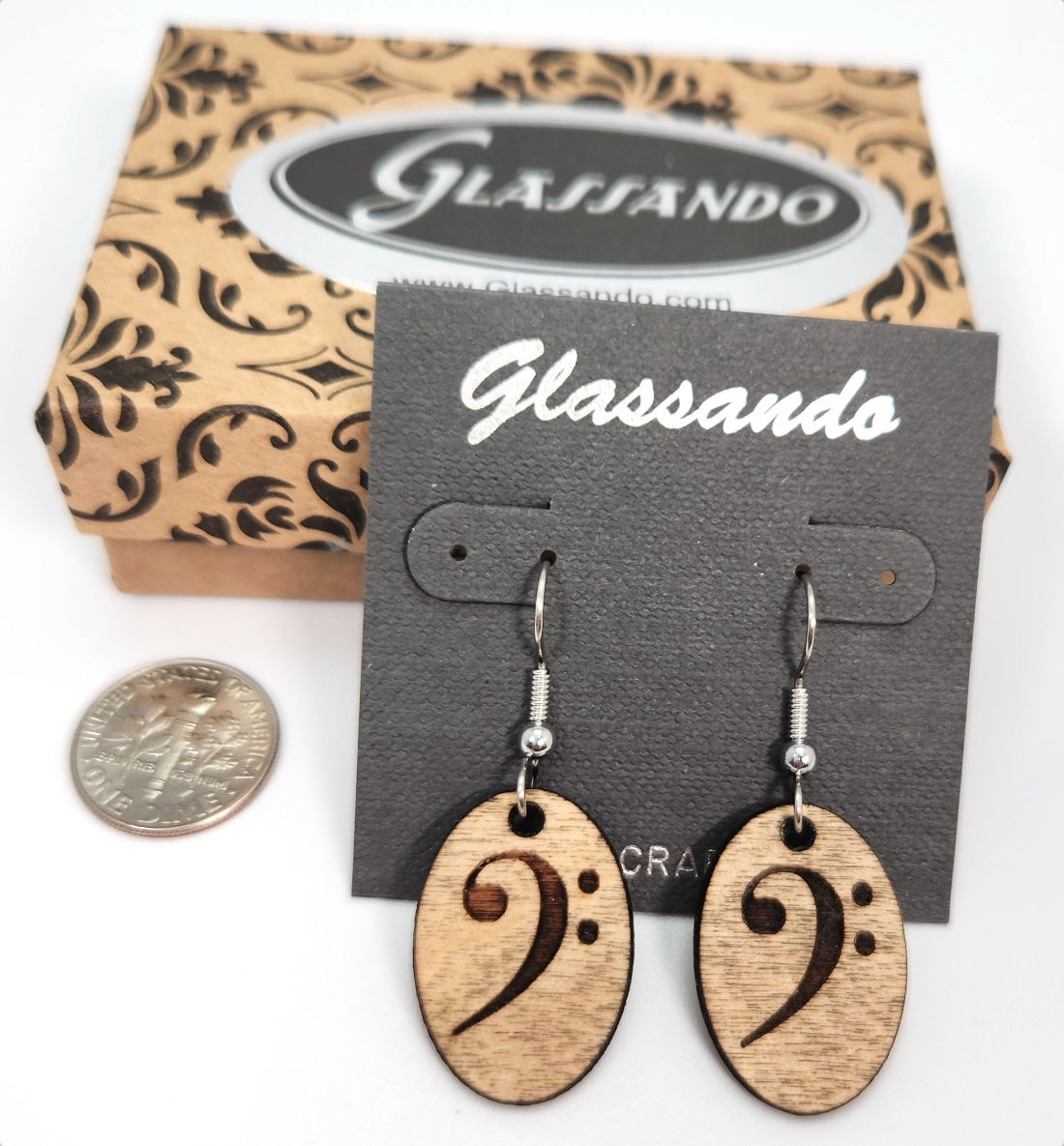 bass clef earrings with dime for size comparison