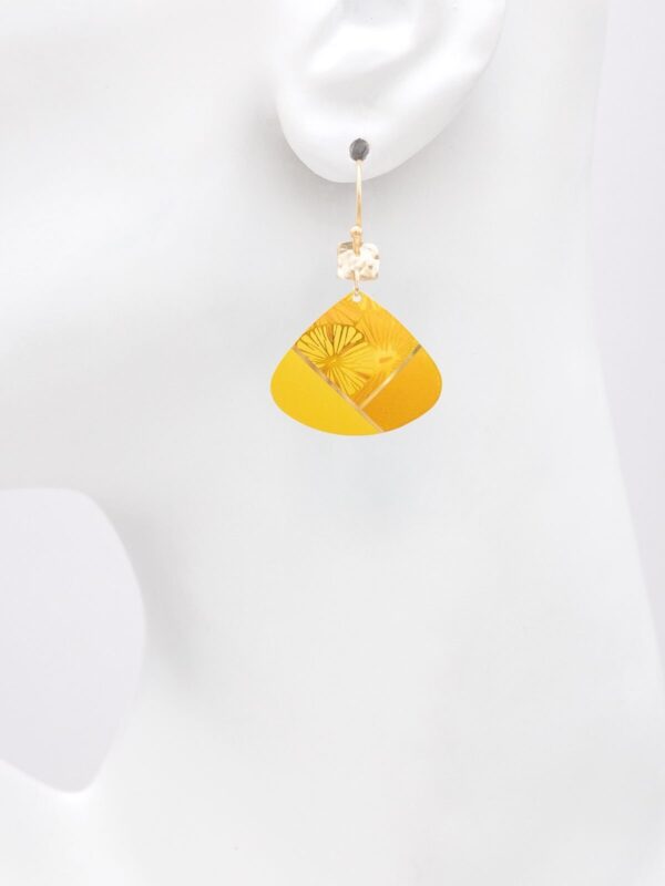 Holly Yashi Yellow drop earrings on model