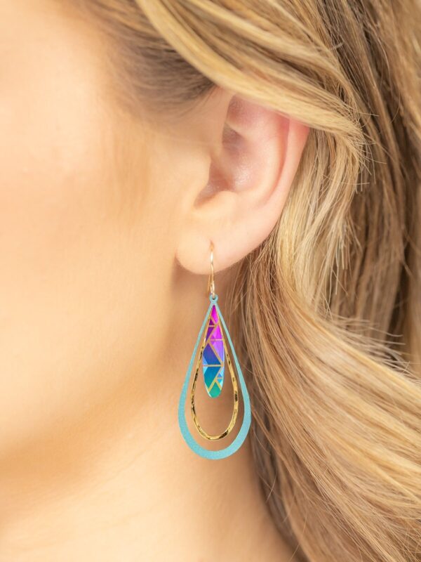 Colorful drop earrings from Holly Yashi on model