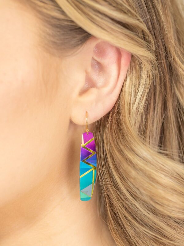 Del Ray statement earrings in turquoise color on model