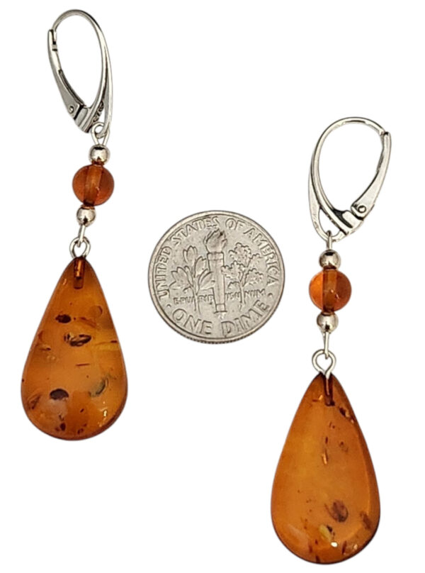 amber drop earrings with dime for size comparison