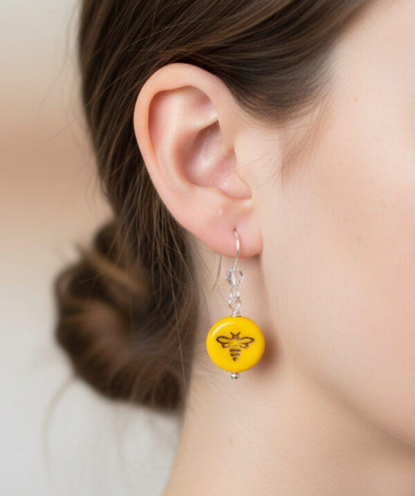 bee earrings on model
