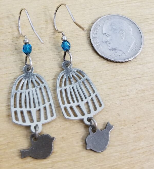 back of earrings with dime for scale