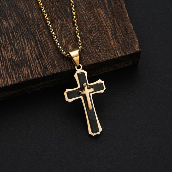 black and goldtone stainless steel cross necklace