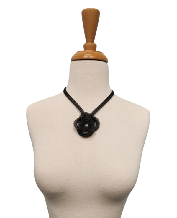 Black mesh knot necklace on mannequin