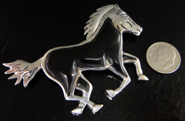 black onyx and sterling silver horse pin with dime for scale