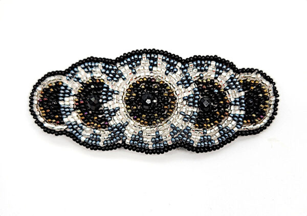beaded barrette in black, gray, white, and bronze colors