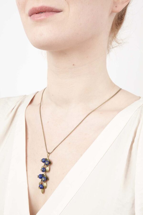 blueberry necklace on model