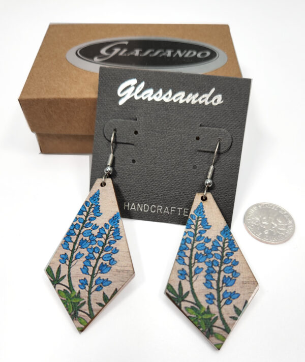 blue flower earrings with dime to show scale