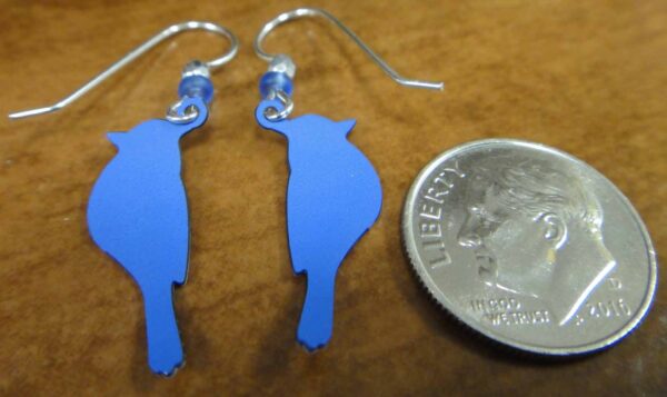 back of blue jay earrings with dime for scale