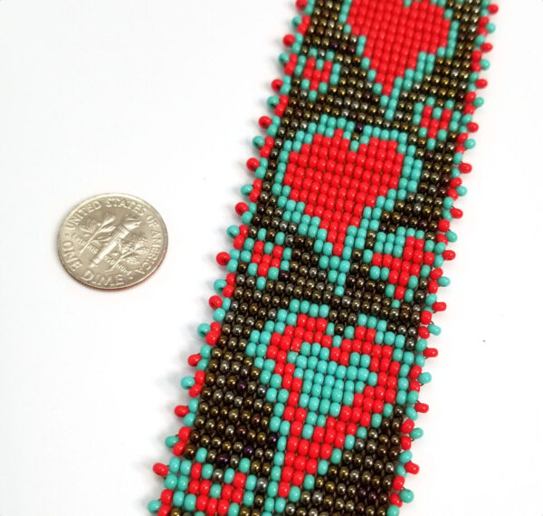 detail of woven heart seed bead necklace