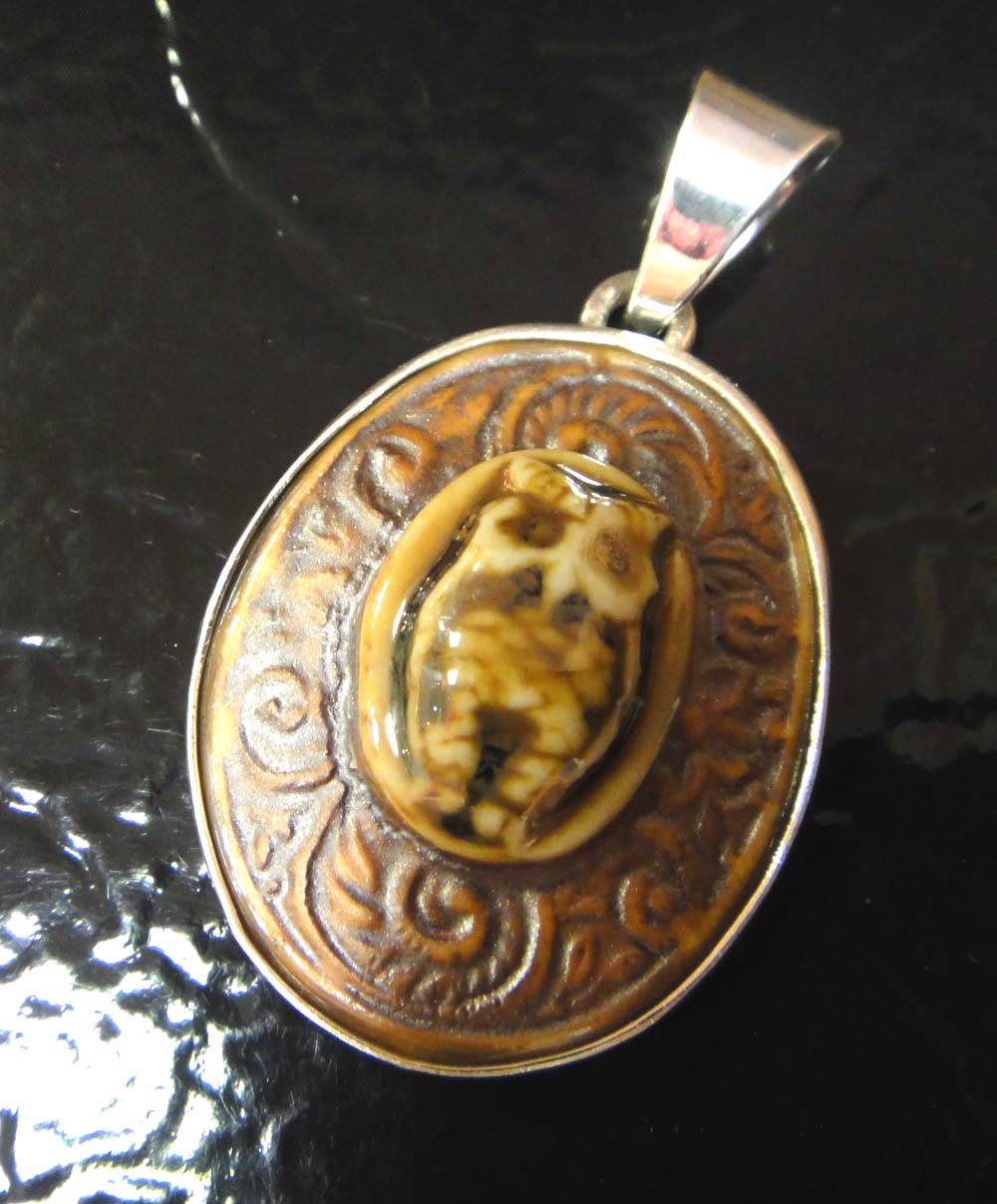 brown porcelain owl with paisley design and sterling silver pendant