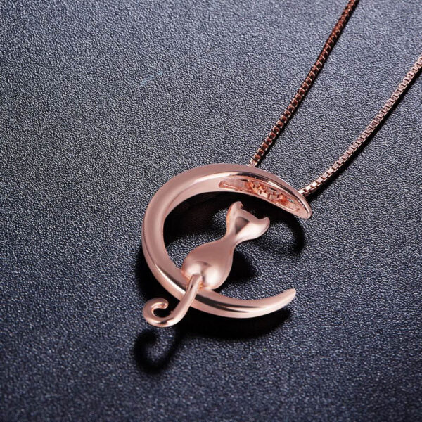 side view of cat on the moon necklace