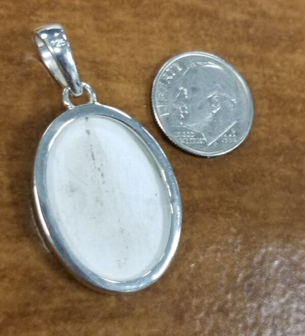 back of oval ceramic pendant