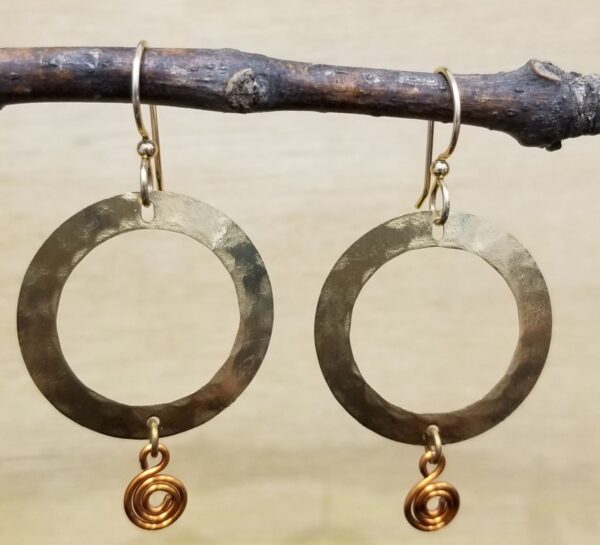 gold-tone earrings with copper swirls by Joseph Brinton