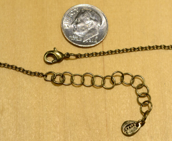 Clasp for Michael Michaud clover necklace, shown with dime (not included) for scale
