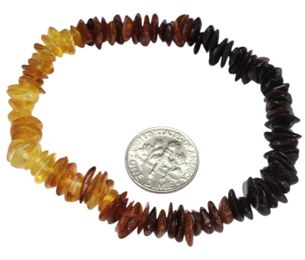 amber bracelet with dime for size comparison