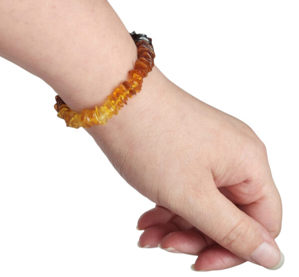 amber bracelet on wrist