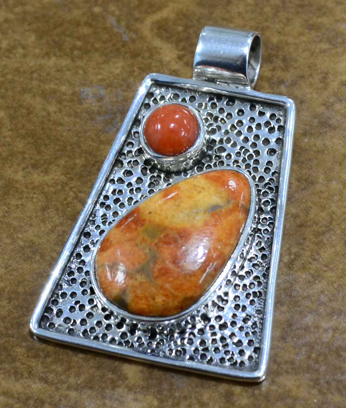 red and orange coral and sterling silver pendant