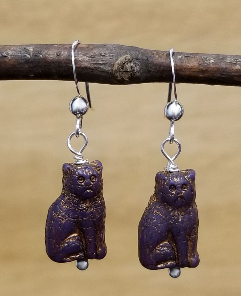dark purple cat earrings